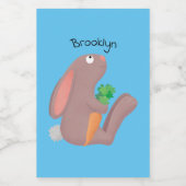 Cute bunny rabbit, zittend met wortelcartoon voedselcontainer etiket (Enkel label)