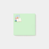 Cute Cat bovenop een boekenstapel op groen Post-it® Notes (Voorkant)