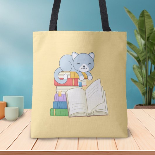 Cute Cat bovenop een boekenstapel Tote Bag