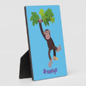 Cute chimpansee in oerwoud hangende cartoon fotoplaat (Zijkant)