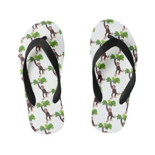 Cute chimpansee in oerwoud hangende cartoon kinder teenslippers