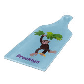 Cute chimpansee in oerwoud hangende cartoon snijplank (Hoek)