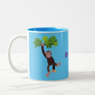 Cute chimpansee in oerwoud hangende cartoon tweekleurige koffiemok