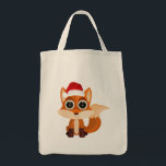 Cute Christmas Fox Cartoon Holiday Animal Festive Tote Bag<br><div class="desc">Carry holiday joy on every shopping trip 🦊🎄 This adorable cartoon fox, with big expressive eyes and a cozy Santa hat, brings cute kawaii vibes, festive charm, and winter aesthetics to your everyday errands. Perfect for groceries, holiday shopping, or as a fun and practical gift, this tote spreads joy wherever...</div>