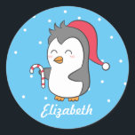Cute Christmas Penguin Candy Cane Name Stickers<br><div class="desc">Een schattig pinguïn ontwerp voor de kleine. Het heeft een cartoon van een schattige en gelukkige pinguïn die op een snoepriet zit en een kerstpet draagt. Een glimlach op je kleine gezicht met dit prachtige ontwerp. Pas de naam van het kind aan.</div>