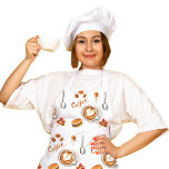 Cute Coffee Schort<br><div class="desc">Voeg een vleugje charme toe aan uw keuken met ons Schattigee Coffee Schort, met een chique waterverf van koffiebonen, espressokopjes en barista-geïnspireerde details. Ontworpen in bruine en beige tinten, is dit schort ideaal voor koffieliefhebbers en brengt het café latte en cappuccino-vibes naar uw dagelijkse routine. Of u nu uw favoriete...</div>