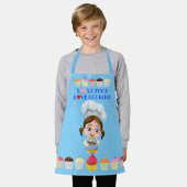 Cute cook cartoon personage met cupcakes schort (Gedragen)