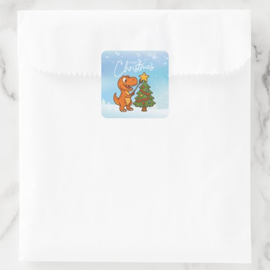 Cute dinosaur with Christmas tree Vierkante Sticker (Tas)