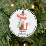 Cute Fox Baby's Kerstwinter Woodland Rustic Keramisch Ornament<br><div class="desc">Dit schattige ontwerp van de winter van de winter van de winter kenmerkt een rustige illustratie van een rode vos met een sjaal en rood pet. Pas de naam, de datum of de tekst van uw kind aan. Ideaal voor het eerste of kerstcadeau van een baby voor een jong kind....</div>