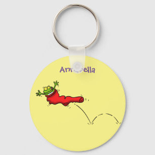 Cute frog in een rode sock springende cartoon sleutelhanger