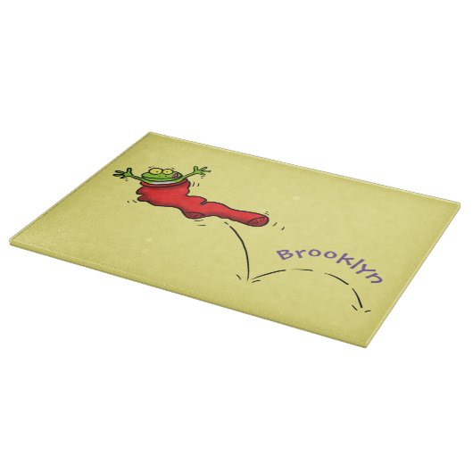 Cute frog in een rode sock springende cartoon snijplank (Hoek)