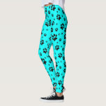 Cute Fun Black op Bright Blauwgroen cyaanschildera Leggings<br><div class="desc">Deze leuke leggings zijn perfect voor honden- en kattenliefhebbers. Ze hebben een schattig patroon met zwarte pootafdrukken verspreid over een heldere blauwgroen of cyaan gekleurde achtergrond. Fun whimsical design is perfect voor huisouders en dierenvrienden.</div>