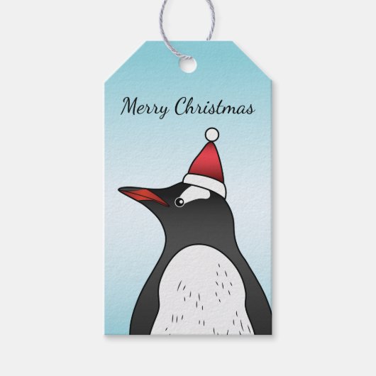 Cute Gentoo Penguin die een kersthat op blauw heef Cadeaulabel (Voorkant)
