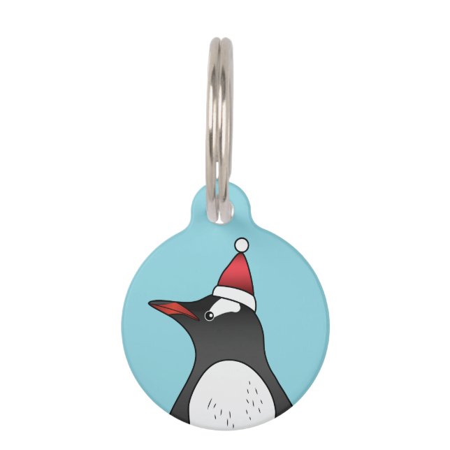 Cute Gentoo Penguin die een kersthat op blauw heef Huisdierpenning (Voorkant)