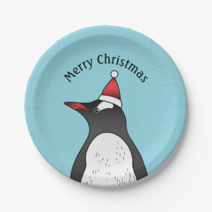 Cute Gentoo Penguin die een kersthat op blauw heef Papieren Bordje