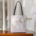 Cute Girly Ivory White Bow on Pink Tote Bag<br><div class="desc">Cute and feminine,  this tote bag design has a large watercolor ivory white bow on a soft blush pink background. The bow is angled to one side adding a touch of charm. A text template is included to personalize with your name.</div>