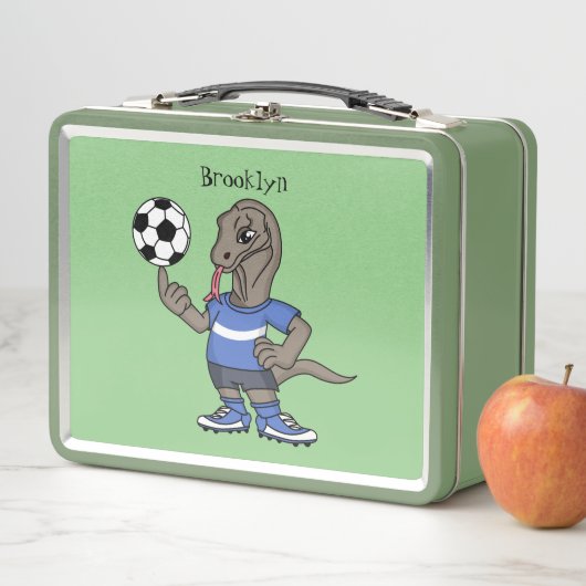 Cute grappige Komodo dragon die voetbal cartoon sp (In situ)