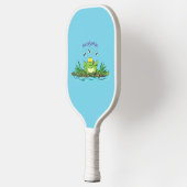 Cute green hongkikker cartoon illustratie pickleball paddle (Links)