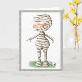 Cute Halloween kaart met een jongen in een mummy k (Gele Bloem)