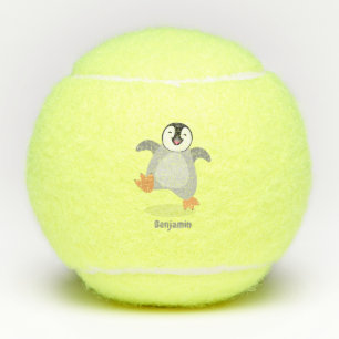 Cute happy emperor pinguin chick cartoon tennisballen