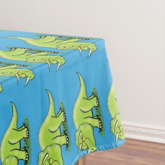 Cute happy green triceratops dinosaur cartoon tafelkleed (Voorbeeld)
