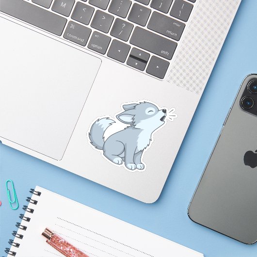 Cute Howling Wolf Pup Sticker (Laptop met iPhone)