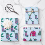 Cute Kerstmis-stoppatroon Inpakpapier Vel<br><div class="desc">Een leuk kerstcadeautje met een pink en blauwgroen met een stel heilig. Elk vel is iets anders - een combinatie van kerstkousen,  heilig en lelijk trui. De achtergrond is bleek blauw op alle drie de bladen,  maar kan gemakkelijk worden veranderd.</div>