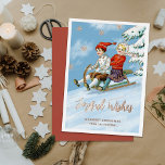Cute  Kinder Sledding Scene | Joyful Wishes Folie Feestdagenkaart<br><div class="desc">Deze schattige, gepersonaliseerde kerstkaart is voorzien van een schilderij van een jongen en een meisje die een heuvel neergesleept hebben. De tekst en accenten van de echte folie voegen een unieke aanraking toe. Bepaalde elementen van het ontwerp zijn afkomstig van een schilderij en zijn hergebruikt/herontworpen. De rug bevat meer tekstsjablonen...</div>
