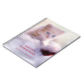 Cute Kitten rust op een kerstman met kerstmis Notitieboek (Linkerzijde)