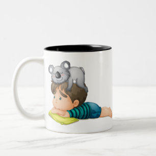 Cute koala speelt met een mooie jongen Australië Tweekleurige Koffiemok