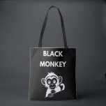 Cute Little Black Monkey Tote Bag<br><div class="desc">Meet your new favorite jungle friend! This adorable peeking monkey design features a clean, white illustration that pops perfectly on dark fabrics. A fun and playful choice for kids, wildlife enthusiasts, or anyone who loves a bit of monkey business.</div>