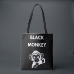 Cute Little Black Monkey Tote Bag<br><div class="desc">Meet your new favorite jungle friend! This adorable peeking monkey design features a clean, white illustration that pops perfectly on dark fabrics. A fun and playful choice for kids, wildlife enthusiasts, or anyone who loves a bit of monkey business.</div>