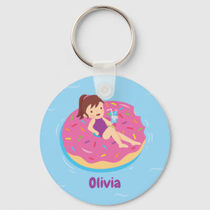 Cute meisje op doughnut zwembad zwem drijver sleut sleutelhanger
