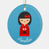 Cute oranje Kokeshi Japanse poppen Keramisch Ornament (Links)