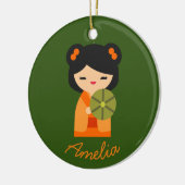 Cute oranje Kokeshi Japanse poppen Keramisch Ornament (Links)