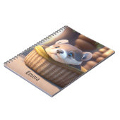 Cute otter baby in een mand - aanpasbaar notitieboek (Linkerzijde)