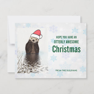 Cute Otter die een kerstcadeautje met Kerstmis hee Feestdagenkaart