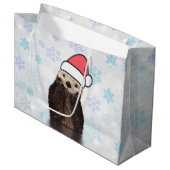 Cute Otter die met Kerstmis een kerstman heeft. Groot Cadeauzakje (Voorkant Gekanteld)