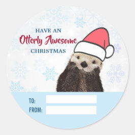Cute Otter die met Kerstmis een kerstman heeft. Ronde Sticker