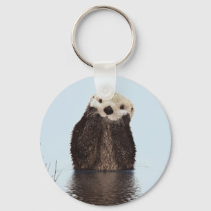 Cute Otter in een Pond die zijn gezicht houdt Sleutelhanger