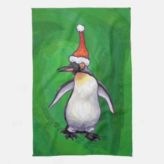 Cute Penguin in Santa Hat over Green Theedoek (Verticaal)