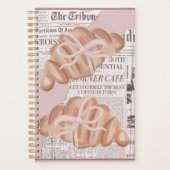 Cute ,pink ,girly planner with croissants . (Voorkant)
