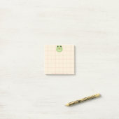 Cute plaknotities met een kikker met een appel post-it® notes (Op bureau)