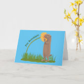 Cute prairie dog sniffing flower cartoon kaart (Gele Bloem)