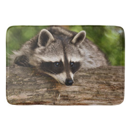 Cute Raccoon Resting on a Log Badmat