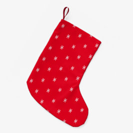 Cute red and white snewflakes patroon kleine kerstsok