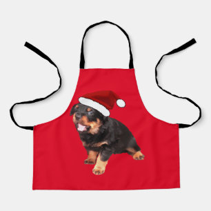 Cute Rottweiler Puppy Wearing Cartoon Santa Hat Schort
