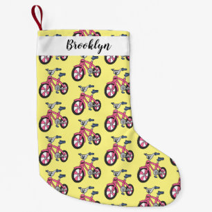 Cute roze kinder fietsenafbeelding cartoon kleine kerstsok