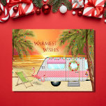 Cute RV Camper Warmest Wish Beach kerst Feestdagenkaart<br><div class="desc">Dit Warmest Wishes vakantieskerst wenskaart is voorzien van een schattige RV-Camper op het strand. Het is versierd met lichten,  een schitterende en twee roze kerstontvlammingdecoraties. De kamper wordt omringd door palmbomen met feestverlichting en tegen de achtergrond staat de zon boven het water. -</div>