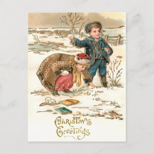 Cute  Schoolchildren die op sneeuw spelen Briefkaart